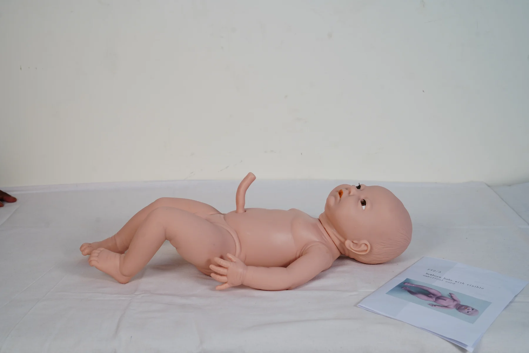 Newborn Baby With Visible Umbilical Cord