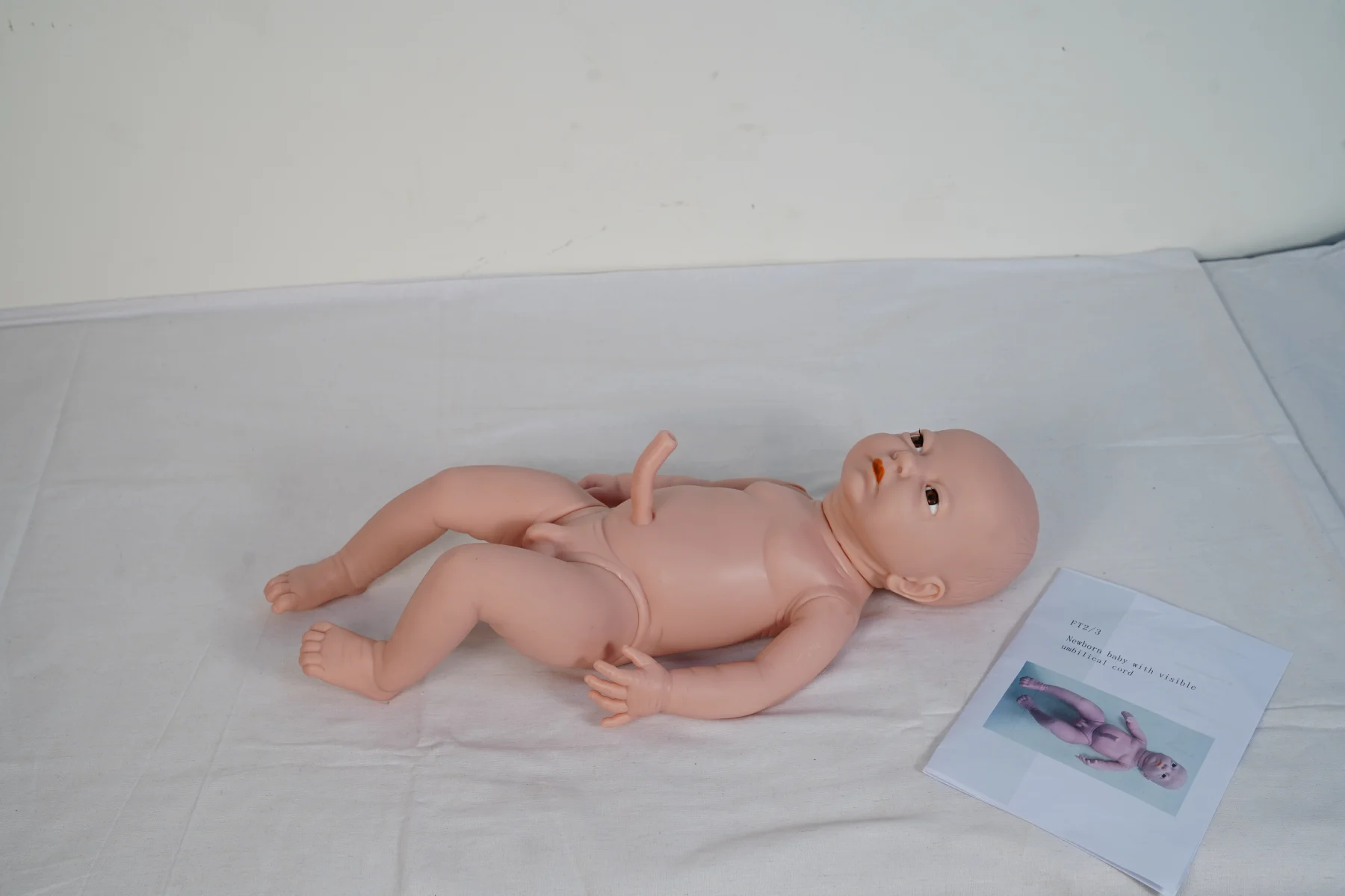Newborn Baby With Visible Umbilical Cord thumbnail 2
