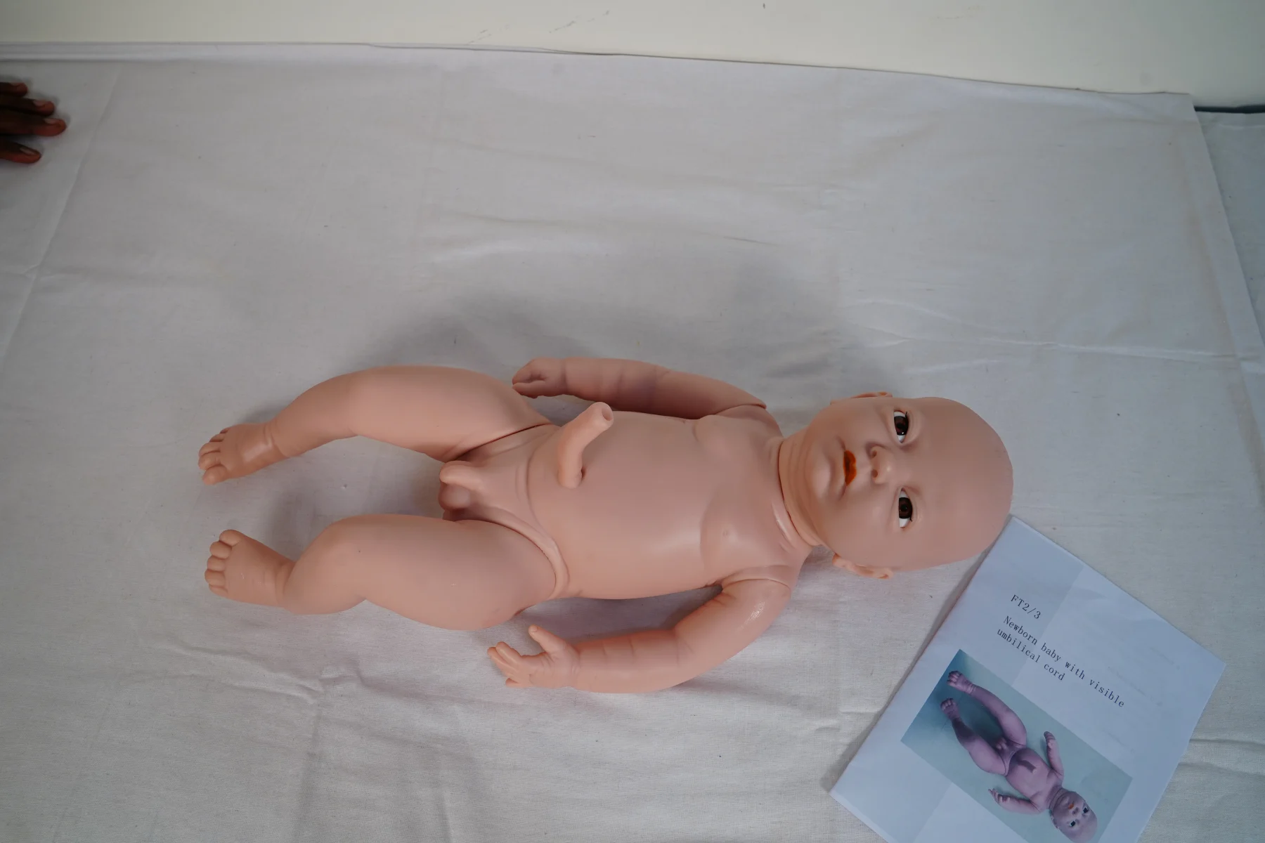 Newborn Baby With Visible Umbilical Cord thumbnail 3